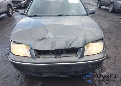 2004 Volkswagen Jetta Gl z USA, uszkodzony, nr VIN 3VWRK69M54M045963